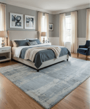 Modern Abstract Blue And Ivory Hand Knotted Wool Area Rug