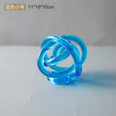 Modern amber & clear glass knot twist sculpture living room decor by Decorbites