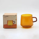 Modern amber glass coffee mug with black rim for kitchen dining room by Decorbites