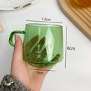 Modern amber glass coffee mug with black rim for kitchen dining room by Decorbites