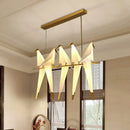 GobekUsa Modern Bird-Shaped Island Pendant Light: 3/4/5 Golden Hanging Lights for Bedroom