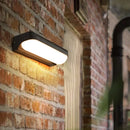 GobekUsa Modern Black Acrylic Wall Sconce with Flush Capsule Design and Half-Bulb Mounting