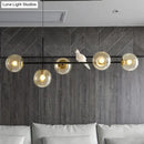 GobekUsa Brass Sphere Ceiling Light with Adjustable Cord - Industrial 5-Light Island Pendant, Amber/Milky White/Smoke Grey Glass Shades
