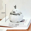 Modern black and silver duck shaped ceramic ashtray living room decor by Decorbites