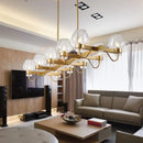GobekUsa Contemporary Island Lamp: 10 Glass Bulbs in Clear/Amber/Smoke Suspended Fixture - Black/Brass for Bedroom