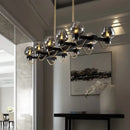 GobekUsa Contemporary Island Lamp: 10 Glass Bulbs in Clear/Amber/Smoke Suspended Fixture - Black/Brass for Bedroom