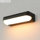GobekUsa Modern Black Acrylic Wall Sconce with Flush Capsule Design and Half-Bulb Mounting