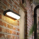 GobekUsa Modern Black Acrylic Wall Sconce with Flush Capsule Design and Half-Bulb Mounting