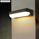 GobekUsa Modern Black Acrylic Wall Sconce with Flush Capsule Design and Half-Bulb Mounting