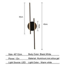 Modern black & chrome led strip wall light for bedroom by Decorbites