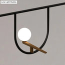 GobekUsa Modern Black Glass Sphere Island Chandelier Light Fixture with Cream Accents - Ceiling Mounted Artistic Lighting