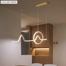 GobekUsa Modern Black/Gold Aluminum Linear LED Island Lighting with Sun and Mountain Design - Warm/White Light