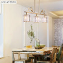 GobekUsa Modern Black/Gold Chandelier Lamp with Clear Crystal Drum Shade, Bird Accent - 3 Heads Hanging Light Fixture