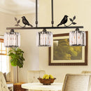 GobekUsa Modern Black/Gold Chandelier Lamp with Clear Crystal Drum Shade, Bird Accent - 3 Heads Hanging Light Fixture