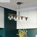 GobekUsa Contemporary Clear Glass Ball Pendant Light with 4 Bulbs - Black and Gold