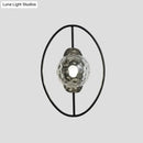 GobekUsa Modern Clear Glass Orb Sconce Lamp - 1-Bulb Black/Gold Wall Light with Ring Detail