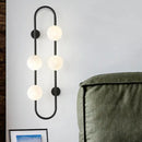 GobekUsa Modern Matte White Glass Globe Wall Sconce with 4-Light Bedroom Lighting Ideas in Black/Gold
