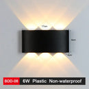 Modern black & gold led wall lamp for living room sleek geometric design by Decorbites