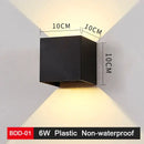 Modern black & gold led wall lamp for living room sleek geometric design by Decorbites