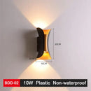 Modern black & gold led wall lamp for living room sleek geometric design by Decorbites