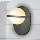 GobekUsa Modern Milk Glass Wall Light with Oval Metal Backplate in Black/Gold for Bedroom Sconce Lighting