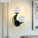 GobekUsa Contemporary Bedroom Sconce Light: 2 Bulbs Black/Gold Wall Lamp with Milky Glass Ball Shades (Left/Right)