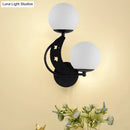GobekUsa Contemporary Bedroom Sconce Light: 2 Bulbs Black/Gold Wall Lamp with Milky Glass Ball Shades (Left/Right)