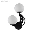 GobekUsa Contemporary Bedroom Sconce Light: 2 Bulbs Black/Gold Wall Lamp with Milky Glass Ball Shades (Left/Right)