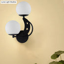 GobekUsa Contemporary Bedroom Sconce Light: 2 Bulbs Black/Gold Wall Lamp with Milky Glass Ball Shades (Left/Right)