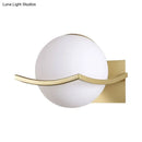 GobekUsa Modern Opal Glass Globe Wall Sconce with 1 Light - Bedroom Lighting in Black/Gold
