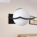 GobekUsa Modern Opal Glass Globe Wall Sconce with 1 Light - Bedroom Lighting in Black/Gold