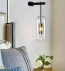 GobekUsa Modern Wall Mounted Clear Glass Cylinder Sconce Light Fixture - 1 Light, Black/Gold