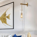 GobekUsa Modern Wall Mounted Clear Glass Cylinder Sconce Light Fixture - 1 Light, Black/Gold