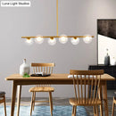GobekUsa Sleek 6-Light Modern Island Pendant: Transparent Glass Ceiling Light for Dining Table