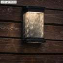 GobekUsa Modern Black LED Outdoor Wall Sconce with Rippled Glass in Rectangle Design