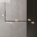 GobekUsa Modern Minimalism Black Linear 6-Light Island Pendant Lighting with Sphere Glass Shade for Living Room.