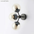 GobekUsa Sleek Black Glass Wall Mounted Vanity Light with 3 Spherical Bulbs - Modern Bathroom Lighting