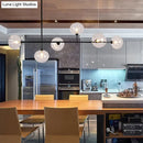 GobekUsa Modern Black Metal Chandelier with Glass Bubble Shade – 6-Light Restaurant Hanging Pendant for Stylish Ambiance