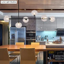 GobekUsa Modern Black Metal Chandelier with Glass Bubble Shade – 6-Light Restaurant Hanging Pendant for Stylish Ambiance