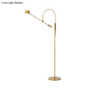 GobekUsa Modern Black Metal Floor Lamp with Unique Linear Capsule Arch Design for Living Room