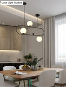 GobekUsa Minimalist Ellipse Pendant Light: Modern Glass Globe Ceiling Fixture for Living Room Island