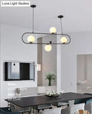 GobekUsa Minimalist Ellipse Pendant Light: Modern Glass Globe Ceiling Fixture for Living Room Island