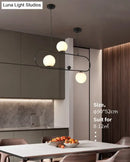 GobekUsa Minimalist Ellipse Pendant Light: Modern Glass Globe Ceiling Fixture for Living Room Island