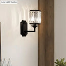 GobekUsa Modern Metallic Cylinder Wall Lamp: 1 Light Sconce with Clear Crystal Prism in Black for Corridor