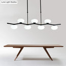GobekUsa Modern Black Wavy Pendant Light - 7-Light White Glass Ceiling Island Lamp with Extendable Rods