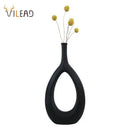 Modern black & white ceramic vase set living room decor by Decorbites