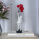 Modern black & white flying love balloon girl sculpture living room decor by Decorbites