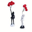 Modern black & white flying love balloon girl sculpture living room decor by Decorbites