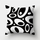 Modern black white & gold geometric stripes pillowcase living room by Decorbites