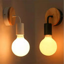 Modern black & white iron art wall light bedroom sconce by Decorbites